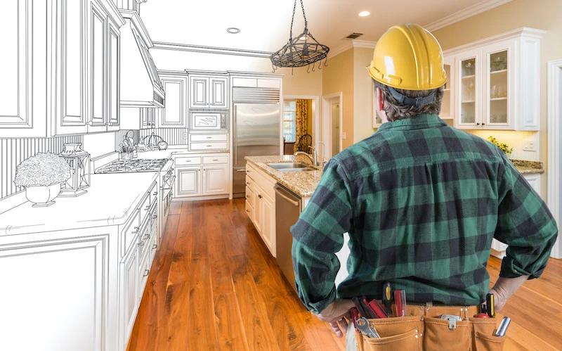 A contractor remodeling a kitchen